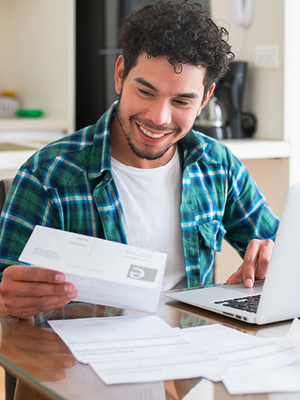 Man looking at a bill