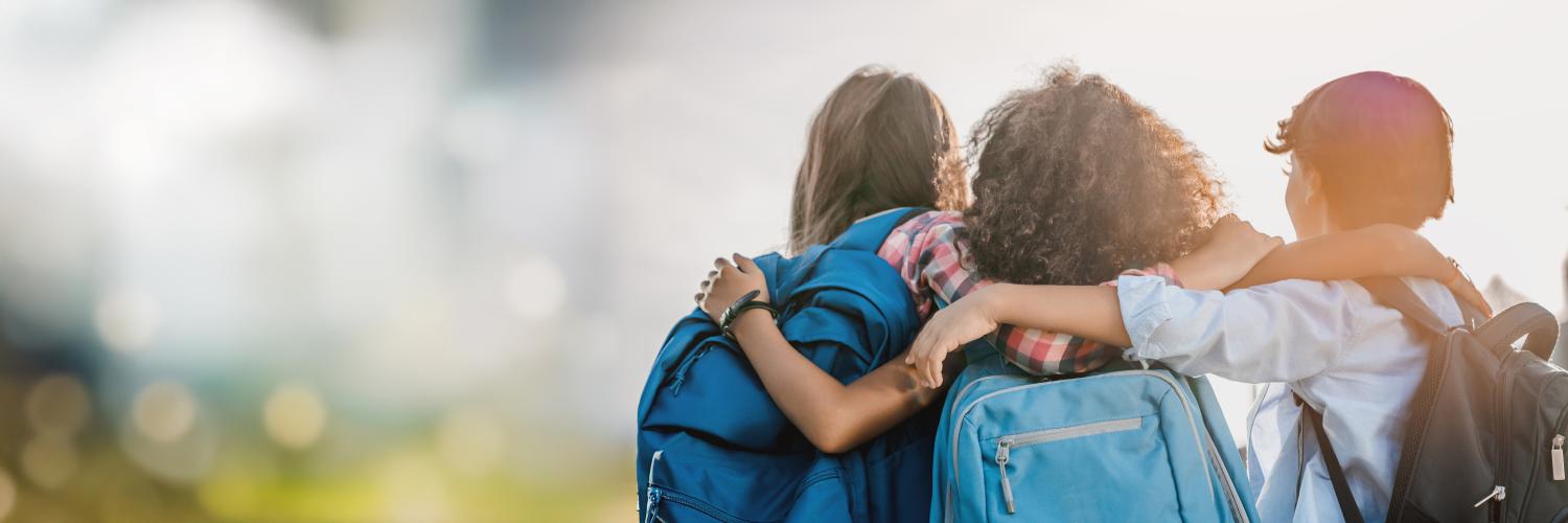 mom sending two kids off to school