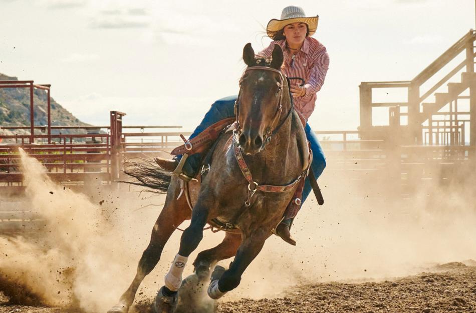 woman riding a horse