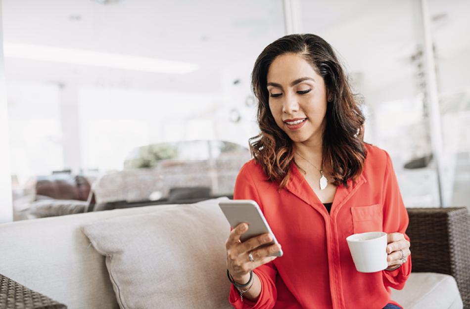 picture of a woman looking at her phone