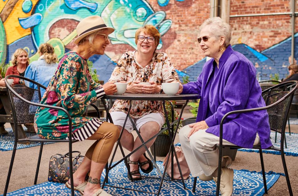 ladies sitting together having coffee