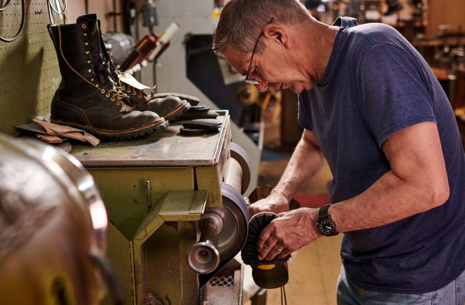 man working in a barn