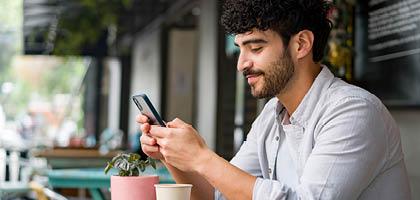 young man using a smart phone