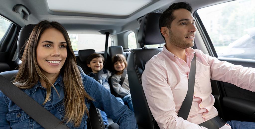 Family driving in a car. 