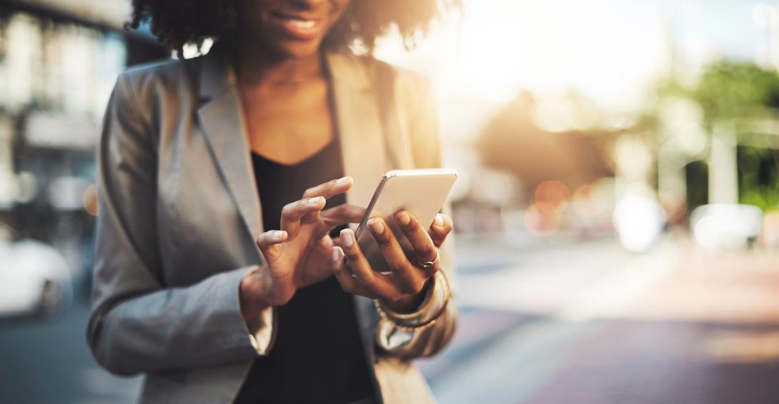 woman looking at her phone